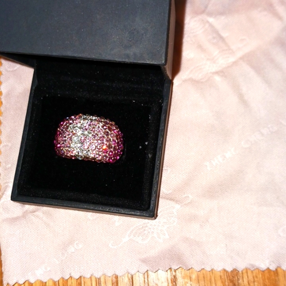 Cascading pink stones from dark to light sterling silver size 8 on ring finger.